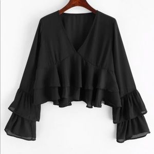 black blouse with ruffles